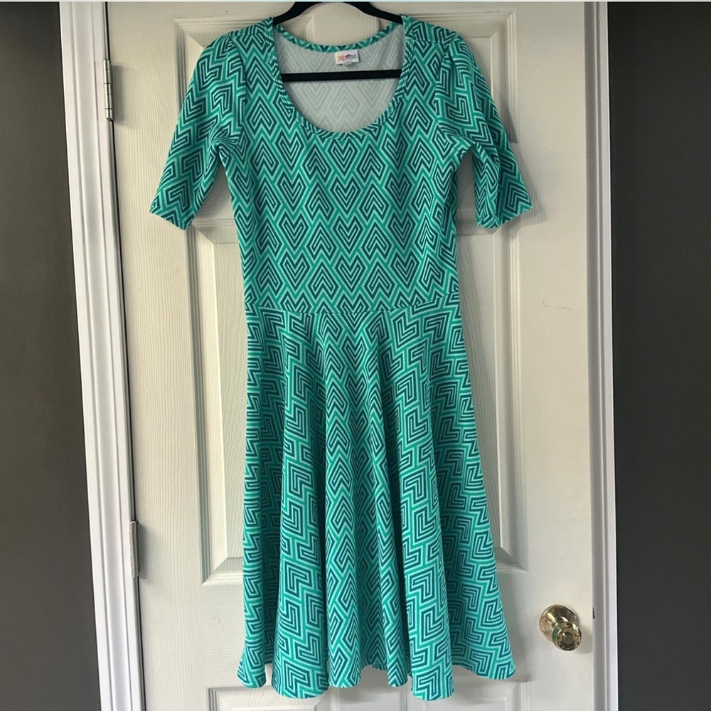 women’s size large LuLaRoe teal patterned dress.